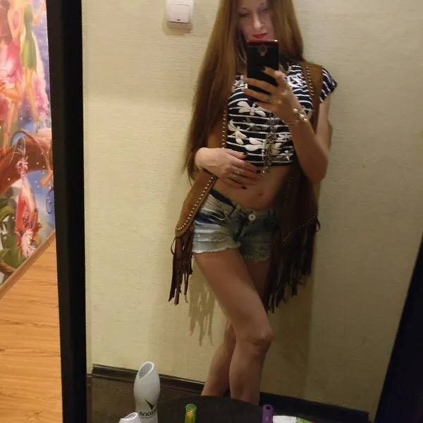 Мила